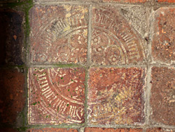 Four-part tile design