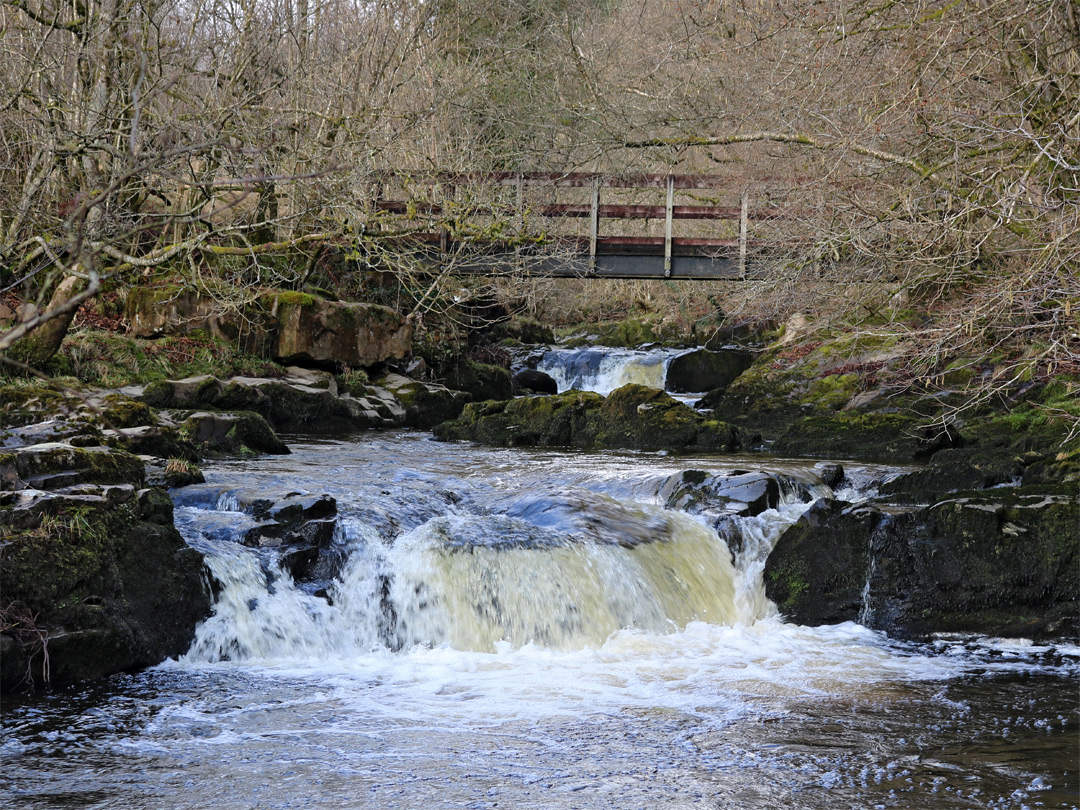 Footbridge above a cascade