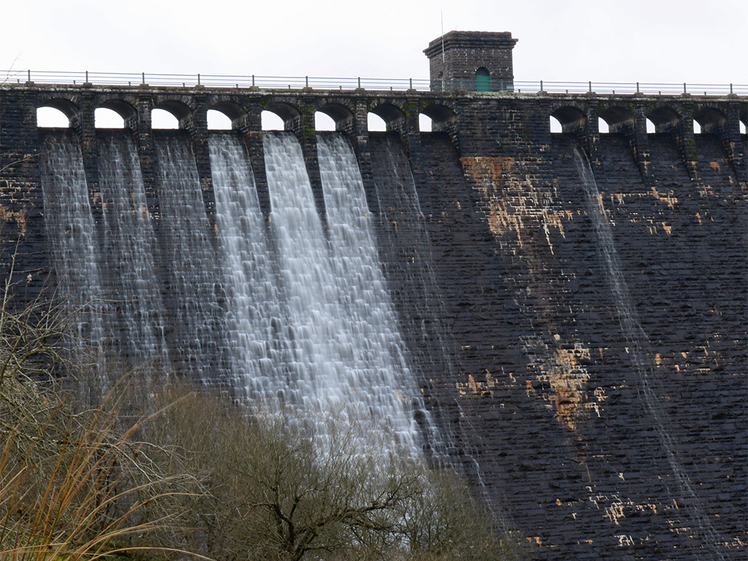 Water flowing over the dam