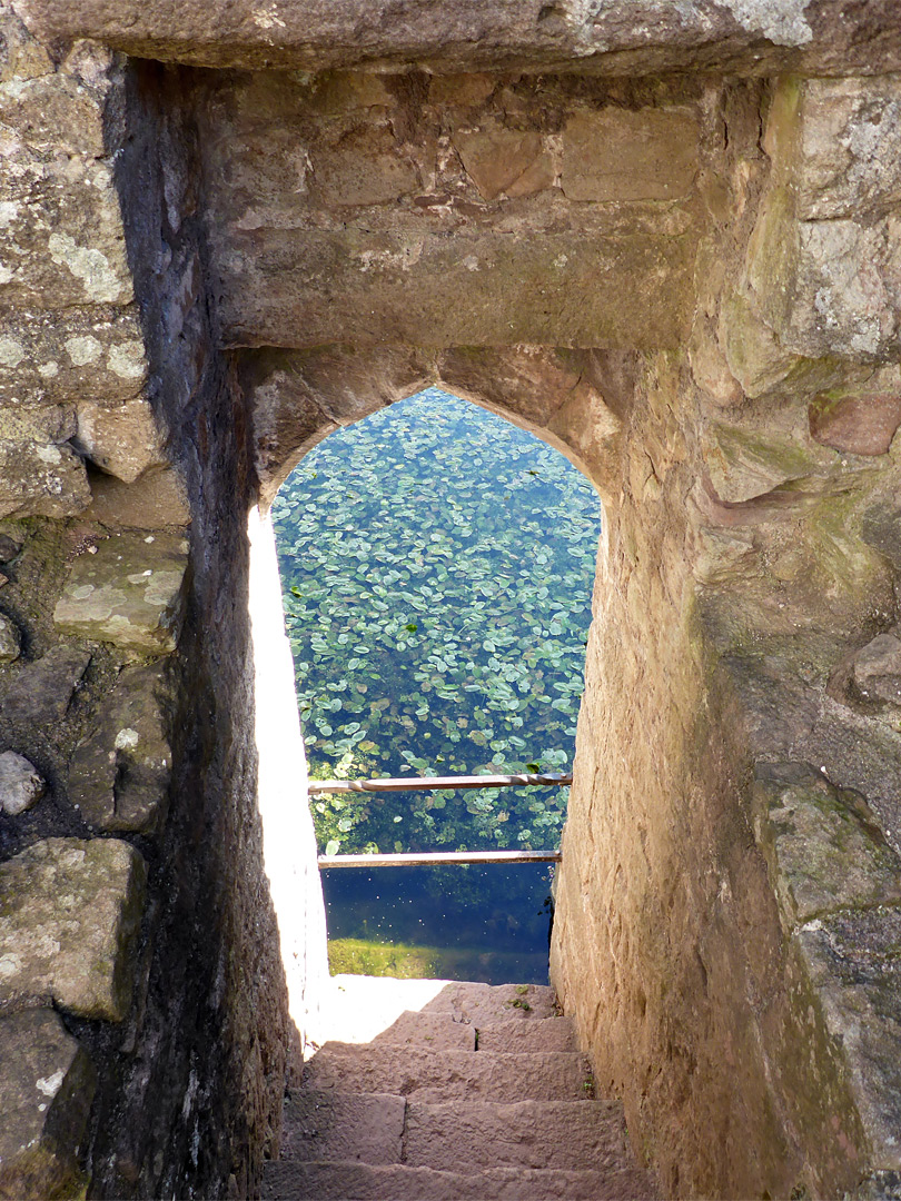 Steps down to the moat