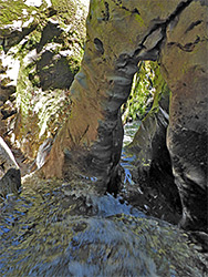 Water-carved arch