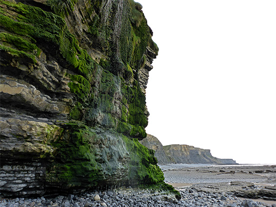 Reddish walls of a narrow sea cave