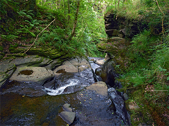 Narrows along the stream, below the roadbridge