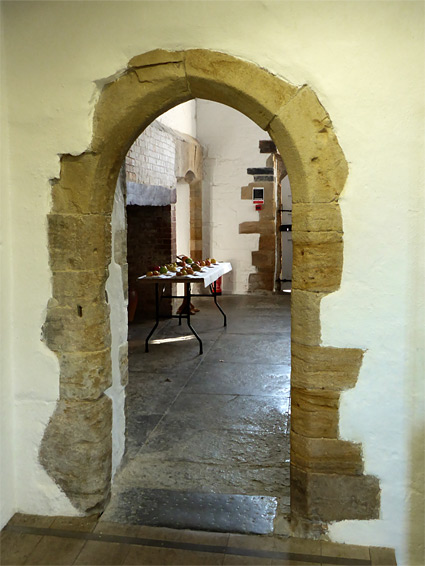 Arched doorway to the kitchen, in the abbot's house