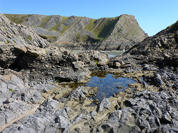 Rock-lined pool below the Knave