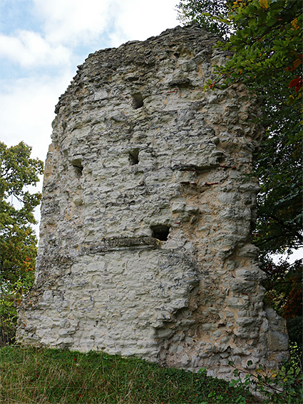 Post holes in the wall fragment on the east side of the castle